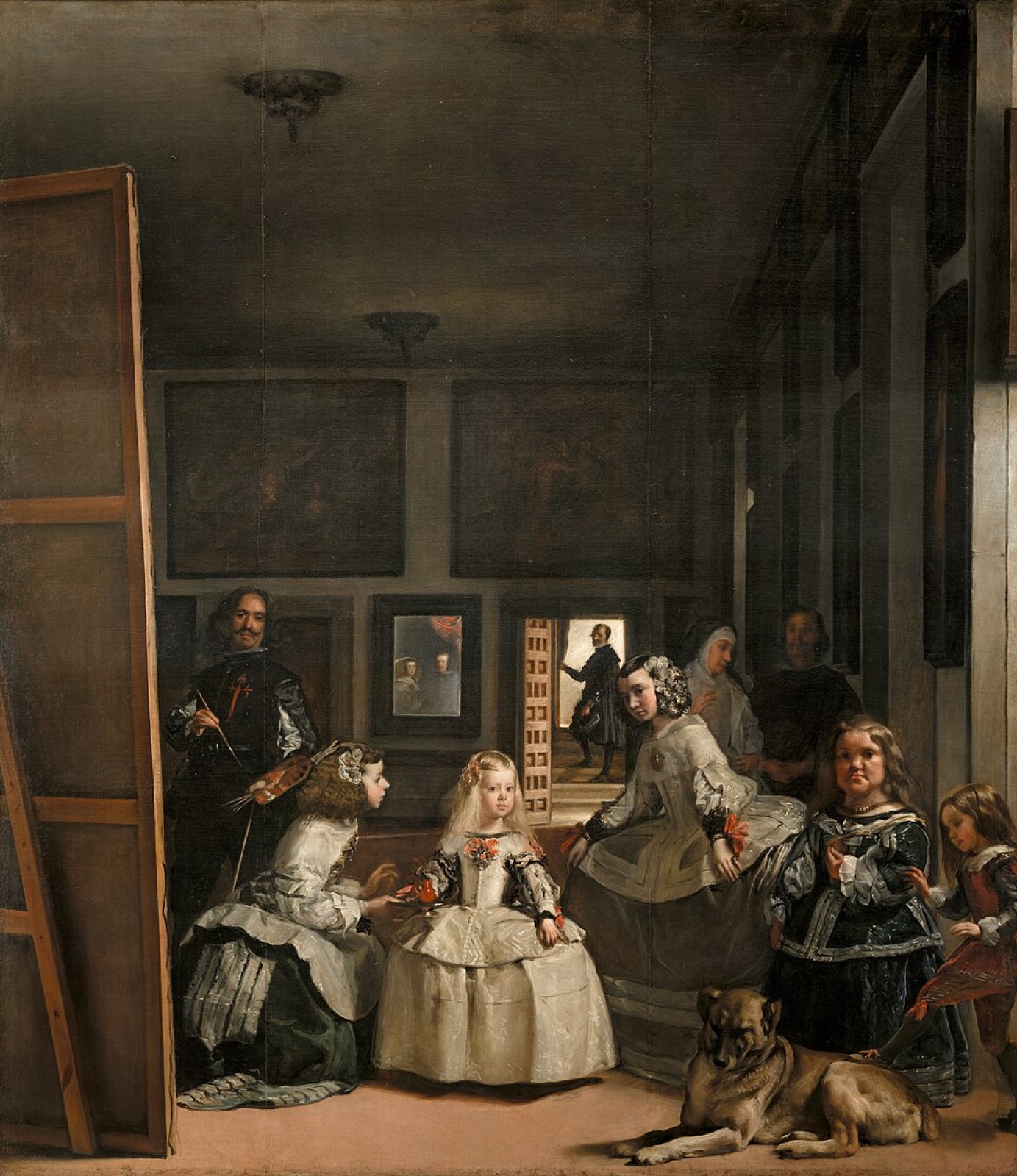 Velázquez standing before the large canvas in Las meninas